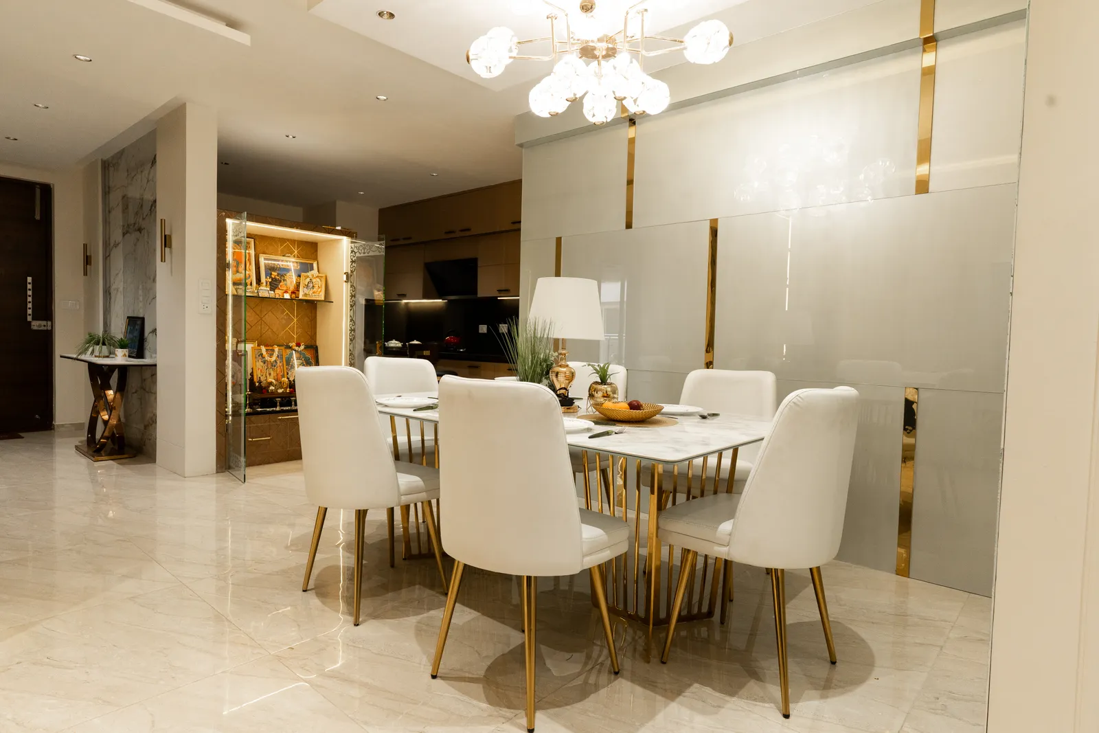 Dining area opening onto the kitchen and pooja unit — Arna's Home